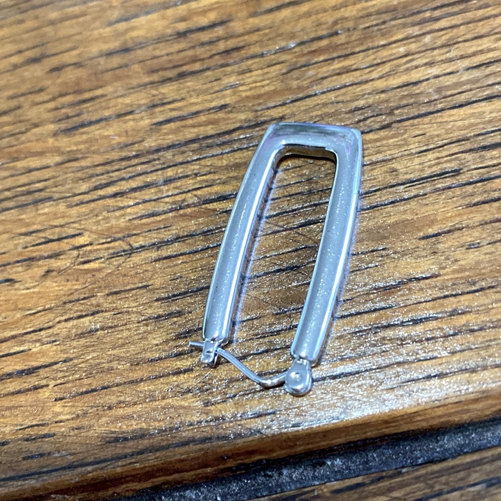 Silver 1.5 in rectangle pierced earrings. Very secure and light. They are pretty - Picture 9 of 12
